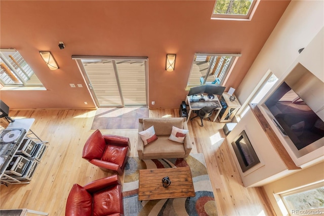 344 Puma Pl, Fairplay, CO 80440 - living room with wood finished floors, plenty of natural light, and a high ceiling