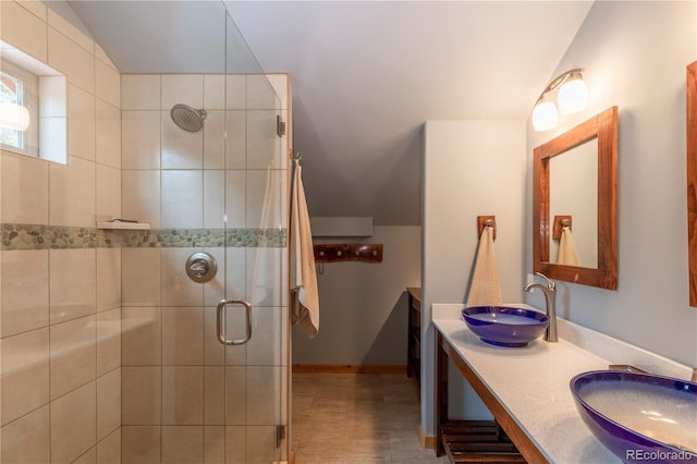 344 Puma Pl, Fairplay, CO 80440 - full bathroom with a shower stall, double vanity, lofted ceiling, and wood finished floors