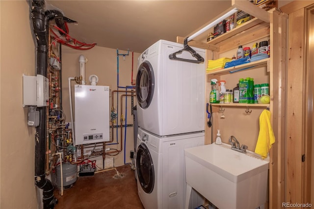 344 Puma Pl, Fairplay, CO 80440 - washroom with water heater and stacked washer / drying machine