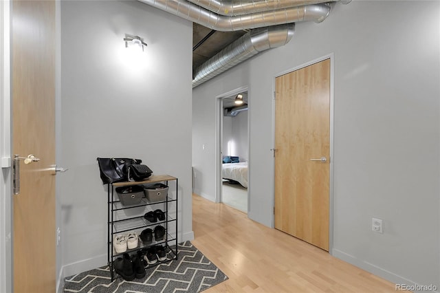 2229 Blake St Unit 505, Denver, CO 80205 - corridor with wood finished floors and baseboards