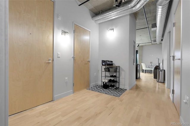 2229 Blake St Unit 505, Denver, CO 80205 - hall with wood finished floors and baseboards