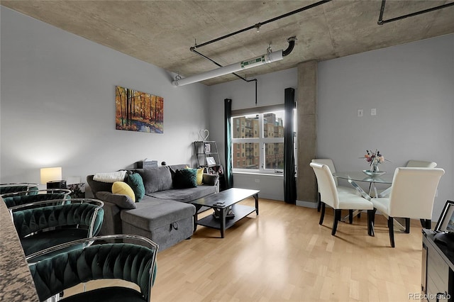 2229 Blake St Unit 505, Denver, CO 80205 - living room with light wood-style floors