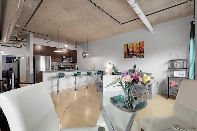 2229 Blake St Unit 505, Denver, CO 80205 - dining room featuring track lighting