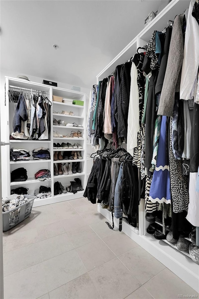 2229 Blake St Unit 505, Denver, CO 80205 - spacious closet featuring tile patterned floors