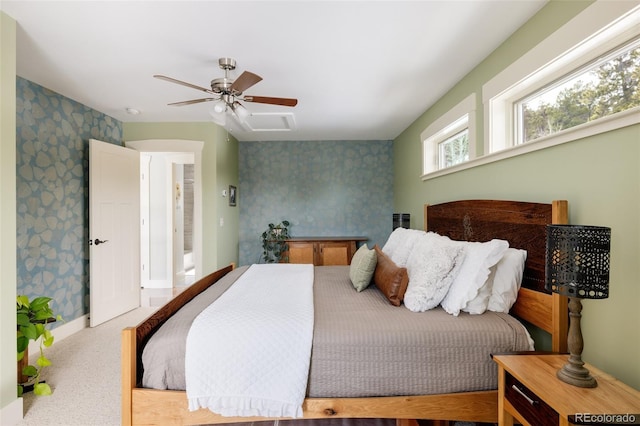 carpeted bedroom with ceiling fan