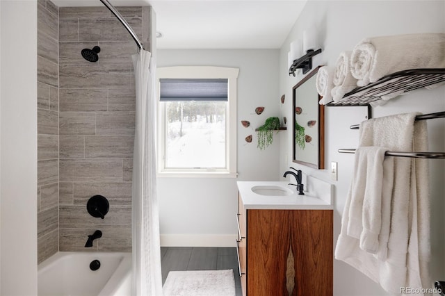 bathroom with vanity and shower / bath combo