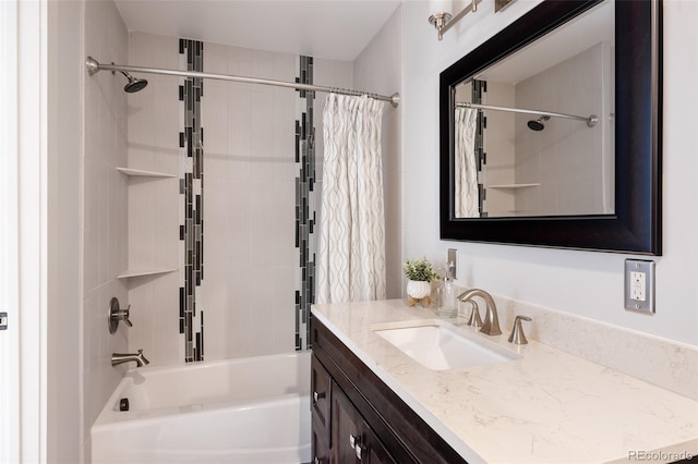 bathroom with vanity and shower / bath combo