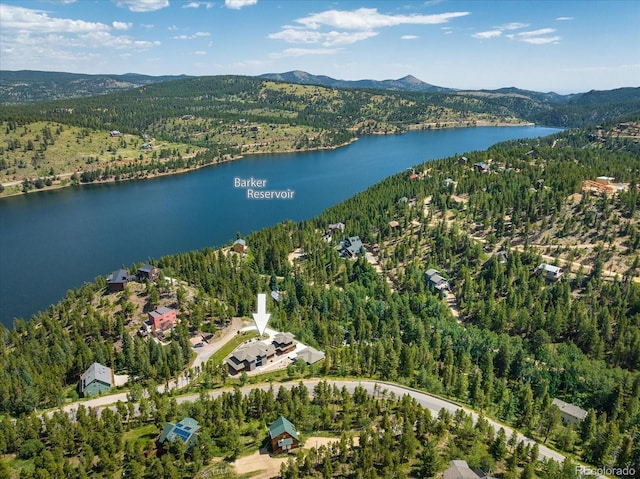 bird's eye view featuring a water and mountain view