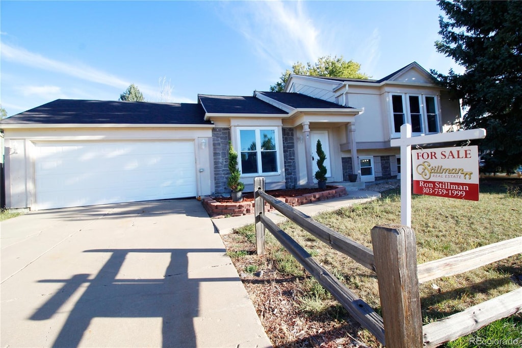 view of front of property with a garage