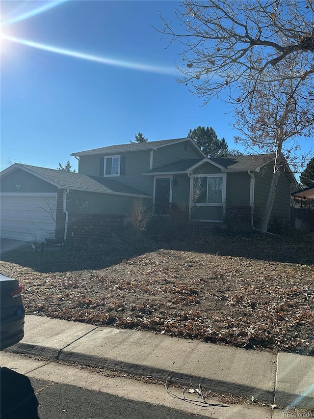 view of front of home with a garage