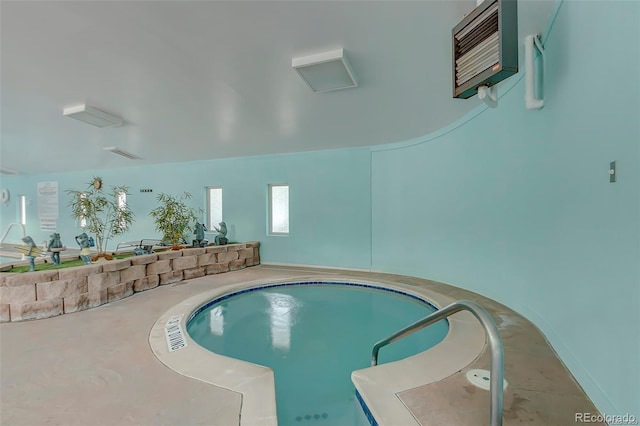 view of pool featuring an AC wall unit