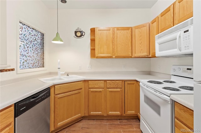 10784 W 63rd Pl Unit 205, Arvada, CO 80004 - kitchen with white appliances, light countertops, decorative light fixtures, wood tiled floors, and open shelves