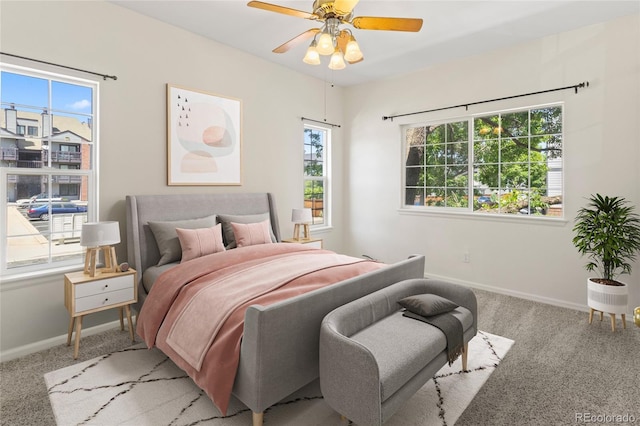 10784 W 63rd Pl Unit 205, Arvada, CO 80004 - carpeted bedroom with baseboards and a ceiling fan