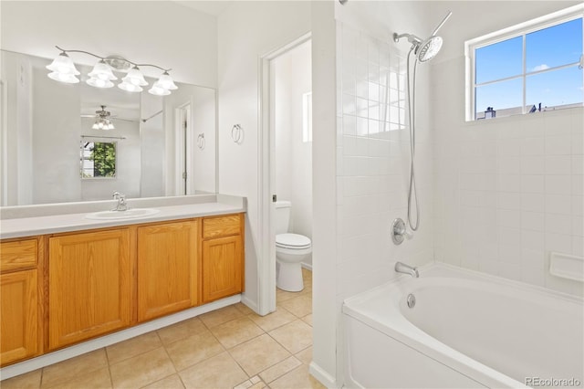 10784 W 63rd Pl Unit 205, Arvada, CO 80004 - full bath featuring healthy amount of natural light, vanity, tile patterned flooring, and shower / bathtub combination