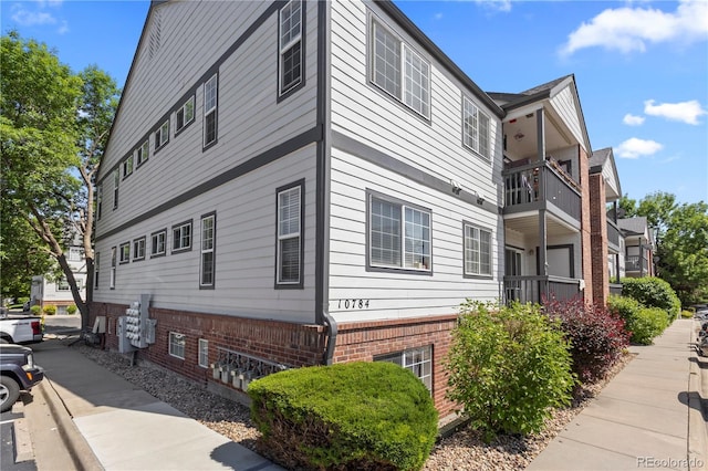 10784 W 63rd Pl Unit 205, Arvada, CO 80004 - view of property exterior with brick siding