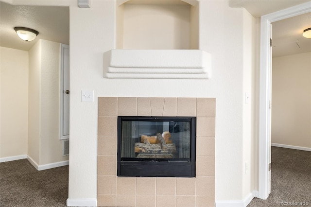 interior details with carpet flooring and a fireplace