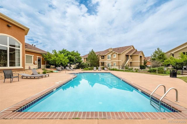 view of pool with a patio area