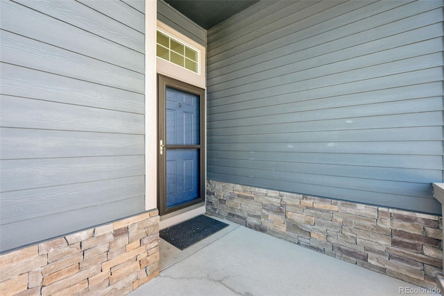 13135 Devils Thumb Pl, Peyton, CO 80831 - property entrance featuring stone siding