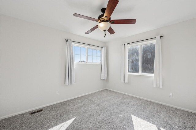 13135 Devils Thumb Pl, Peyton, CO 80831 - spare room with a ceiling fan, baseboards, and carpet