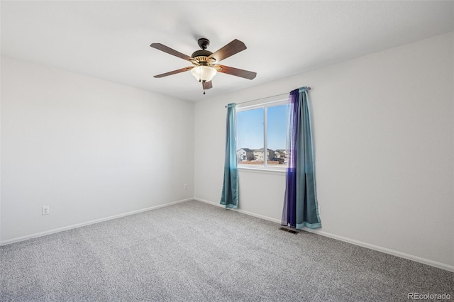 13135 Devils Thumb Pl, Peyton, CO 80831 - spare room with a ceiling fan, carpet, and baseboards