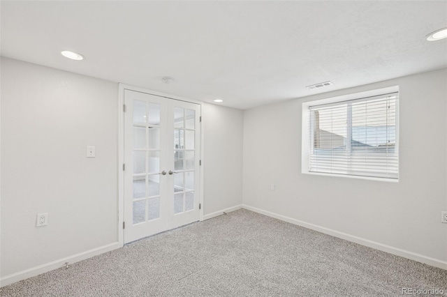 13135 Devils Thumb Pl, Peyton, CO 80831 - empty room featuring french doors, baseboards, carpet floors, and recessed lighting