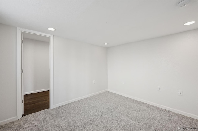 13135 Devils Thumb Pl, Peyton, CO 80831 - spare room featuring carpet floors, recessed lighting, baseboards, and a smoke detector