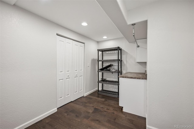 13135 Devils Thumb Pl, Peyton, CO 80831 - corridor with dark wood finished floors, baseboards, and recessed lighting