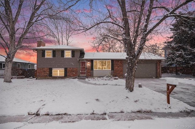 split level home with a garage