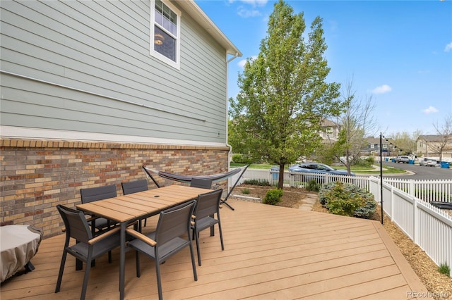 9530 Gray St, Westminster, CO 80031 - wooden deck with a fenced backyard and outdoor dining area