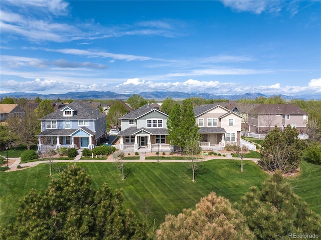 9530 Gray St, Westminster, CO 80031 - aerial perspective of suburban area featuring a mountain backdrop