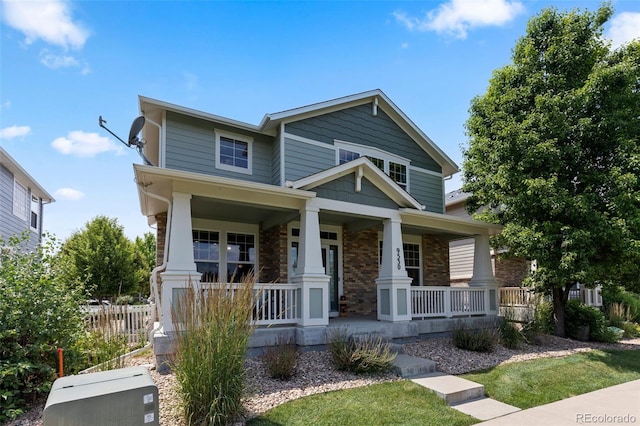 9530 Gray St, Westminster, CO 80031 - craftsman house with covered porch and brick siding