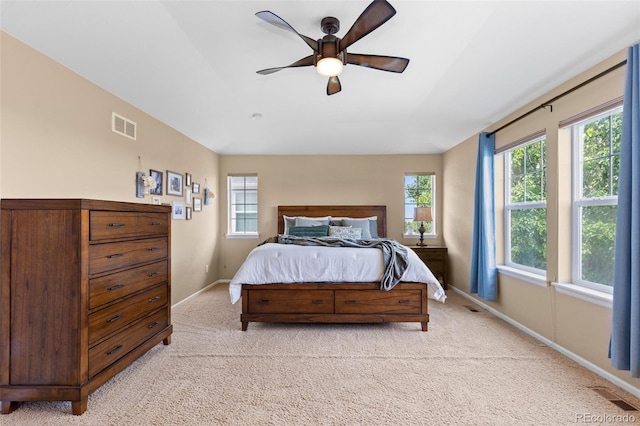 9530 Gray St, Westminster, CO 80031 - bedroom with light colored carpet, multiple windows, and ceiling fan