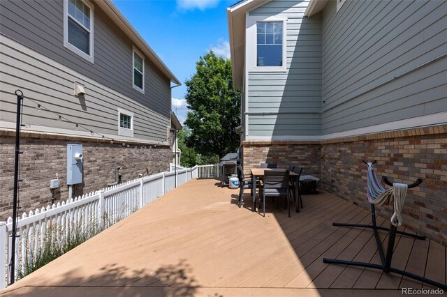 9530 Gray St, Westminster, CO 80031 - wooden terrace with outdoor dining space