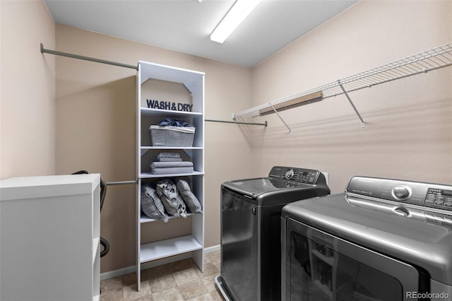 9530 Gray St, Westminster, CO 80031 - laundry area with independent washer and dryer and light stone finish floors