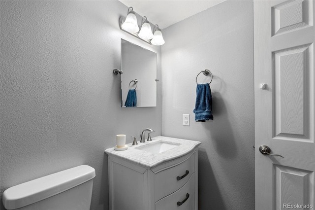 9530 Gray St, Westminster, CO 80031 - half bath featuring vanity and toilet