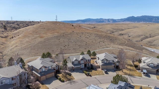 bird's eye view featuring a mountain view and a residential view