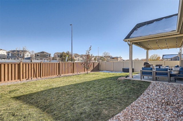 view of yard with a patio area and outdoor lounge area