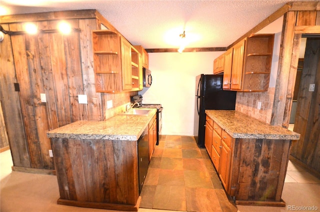 107 Peaks View Ct Unit 324, Blue River, CO 80424 - kitchen featuring open shelves, stainless steel range with electric stovetop, freestanding refrigerator, light countertops, and backsplash