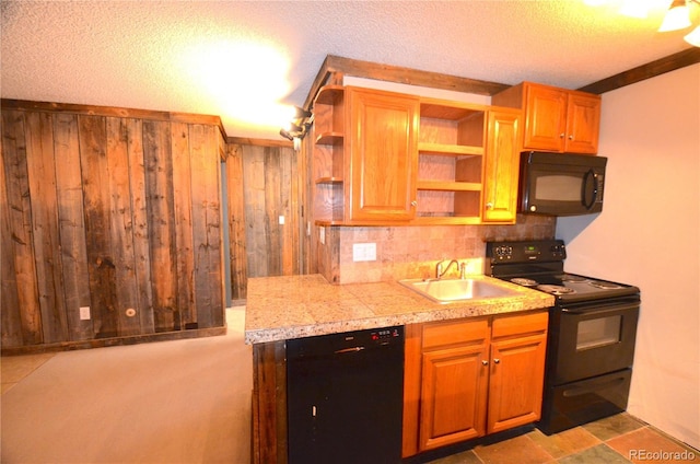 107 Peaks View Ct Unit 324, Blue River, CO 80424 - kitchen featuring black appliances, a sink, open shelves, tasteful backsplash, and wood walls