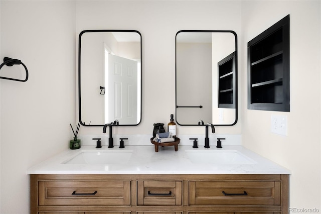 1530 S Quebec Way Unit 24, Denver, CO 80231 - full bathroom featuring double vanity