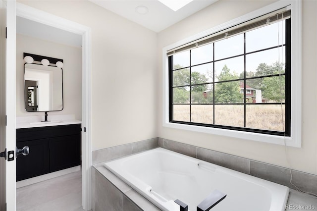 1530 S Quebec Way Unit 24, Denver, CO 80231 - bathroom with a bath and vanity