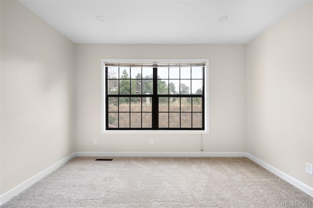 1530 S Quebec Way Unit 24, Denver, CO 80231 - carpeted spare room featuring baseboards