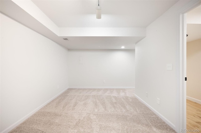 1530 S Quebec Way Unit 24, Denver, CO 80231 - spare room featuring light carpet and recessed lighting