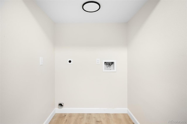 1530 S Quebec Way Unit 24, Denver, CO 80231 - laundry area with washer hookup, electric dryer hookup, and light wood-style floors
