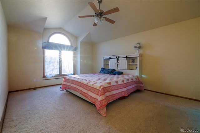 carpeted bedroom featuring ceiling fan and lofted ceiling