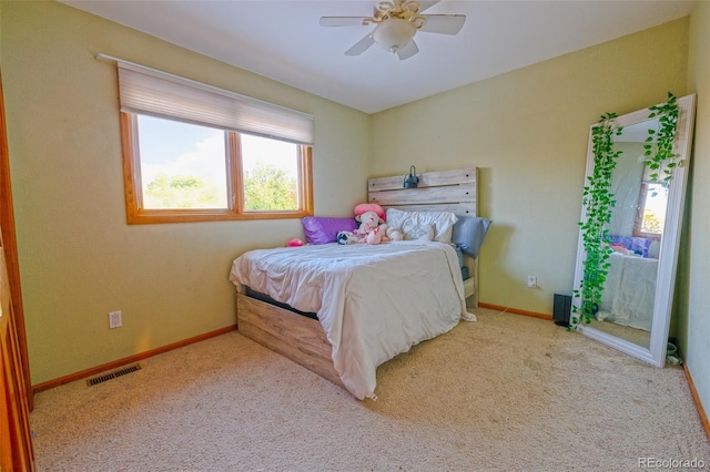 bedroom with light carpet and ceiling fan