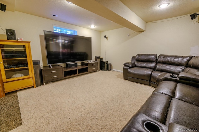 carpeted living room featuring a textured ceiling