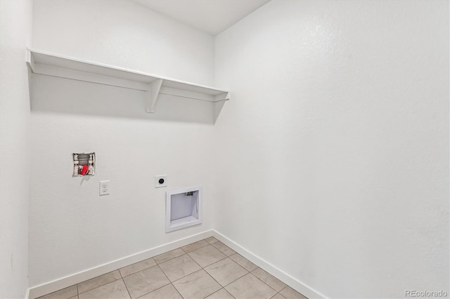 washroom featuring washer hookup, light tile patterned floors, electric dryer hookup, laundry area, and baseboards