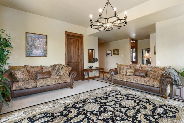 carpeted living room featuring a chandelier