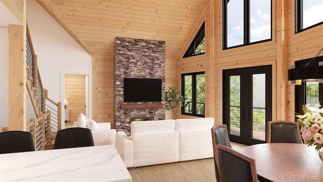 32778 Janelle Ln, Golden, CO 80403 - living area with high vaulted ceiling, wooden walls, light wood-style floors, and wooden ceiling